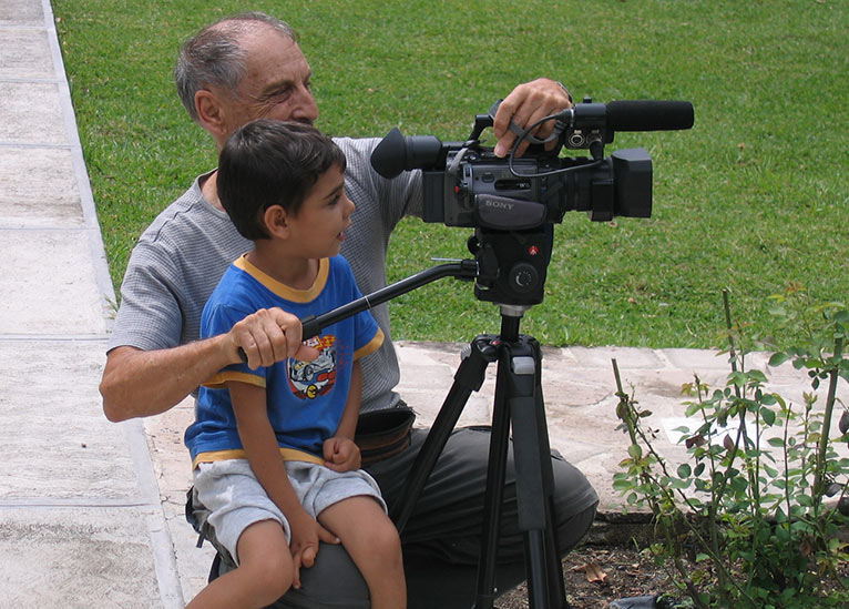 Roy and a Mexican boy filming